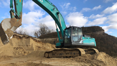 Запас мощности и экономия топлива. Тестируем экскаватор Kobelco 350